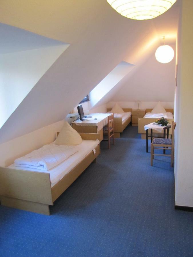 Chambre Triple avec Salle de Bains Commune